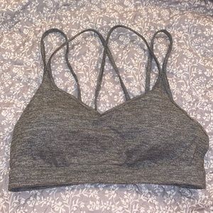 Gray strappy back padded sports bra